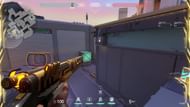 Chamber challenging A Main from the top of the A site radianite crate (Image via Riot Games/Sportskeeda)